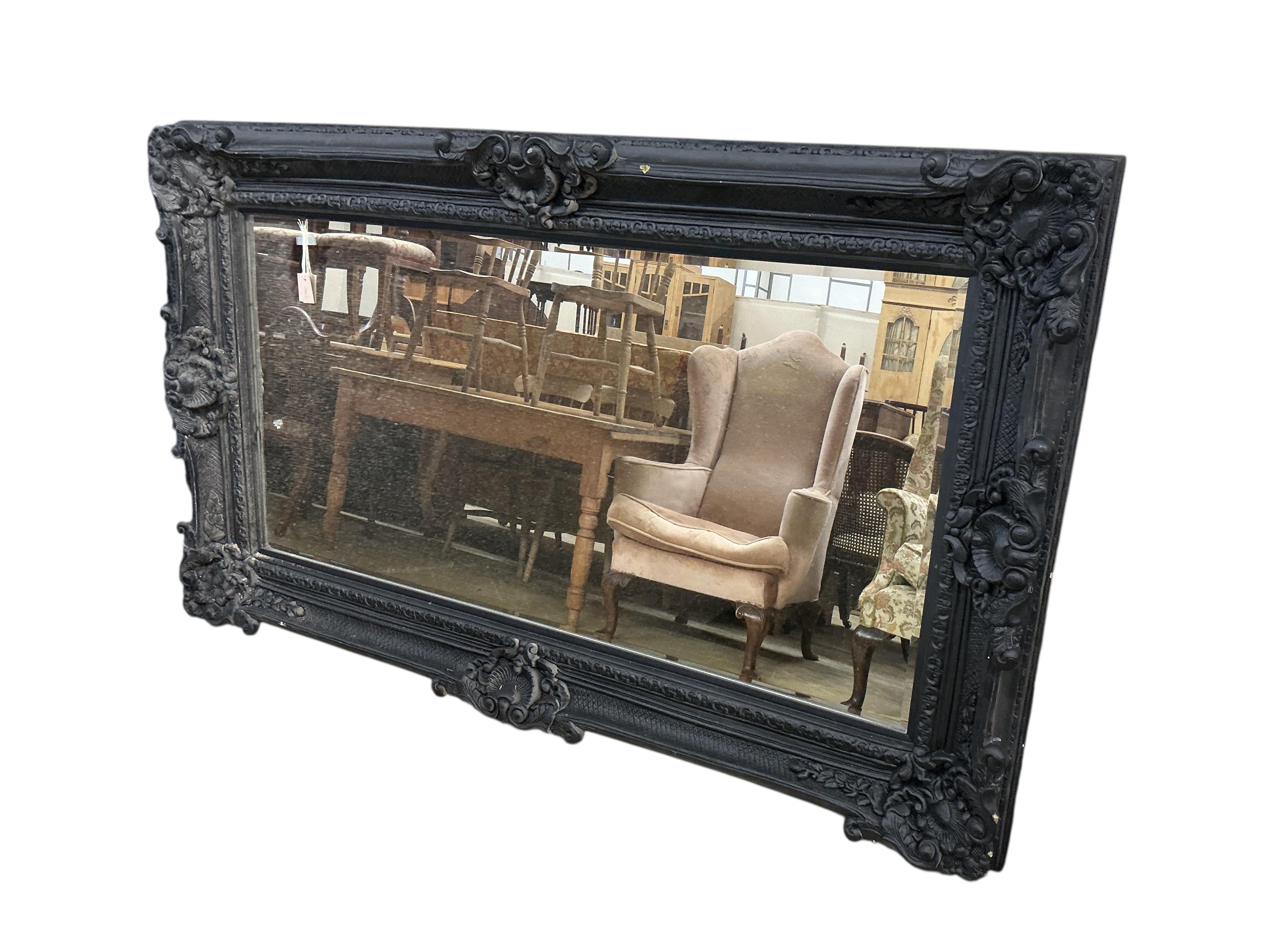 A large Victorian style 'Heritage' rectangular composition wall mirror, width 225cm, height 134cm